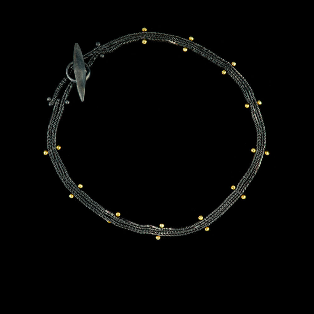 studded woven chain bracelet