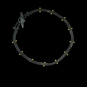 studded woven chain bracelet